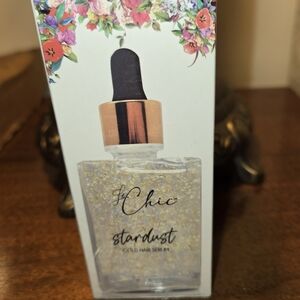 Chic Stardust Gold Hair Serum with Floral Design